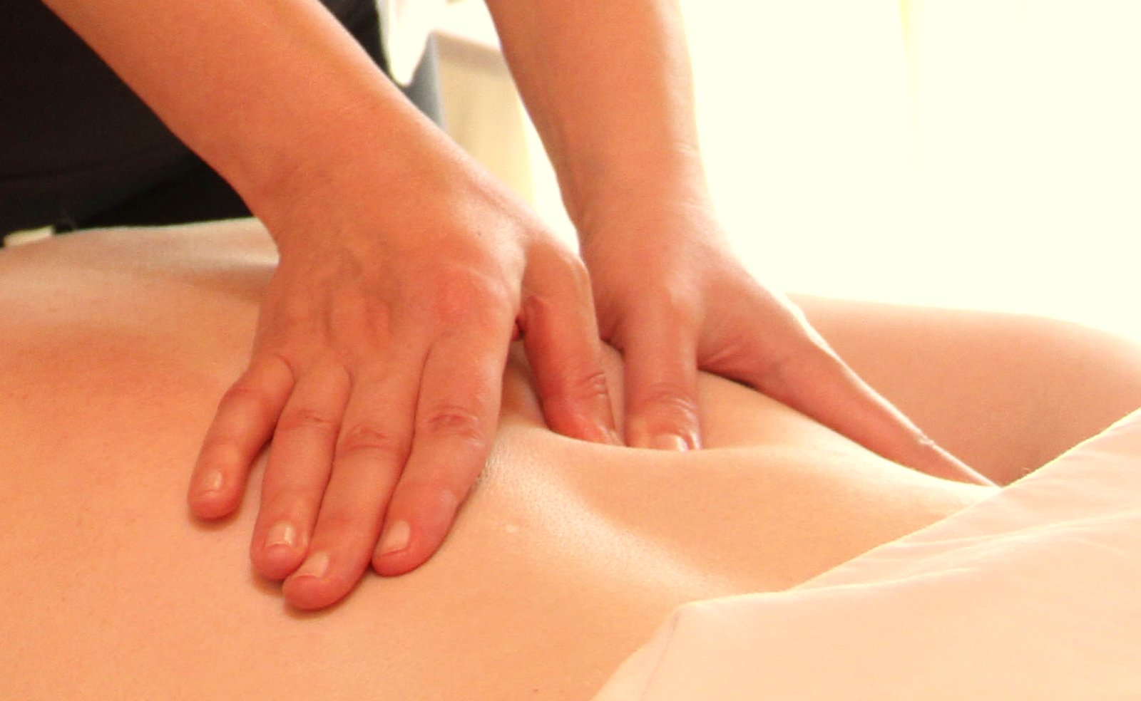 Steady, focused acupressure along a client&rsquo;s back